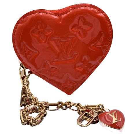 louis vuitton pomme d'amour vernis heart coin purse fake|louis vuitton keep my heart bag.